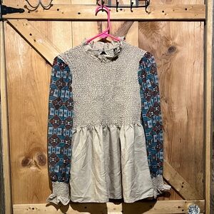 Chic Aztec Blouse with Ruffled Neckline